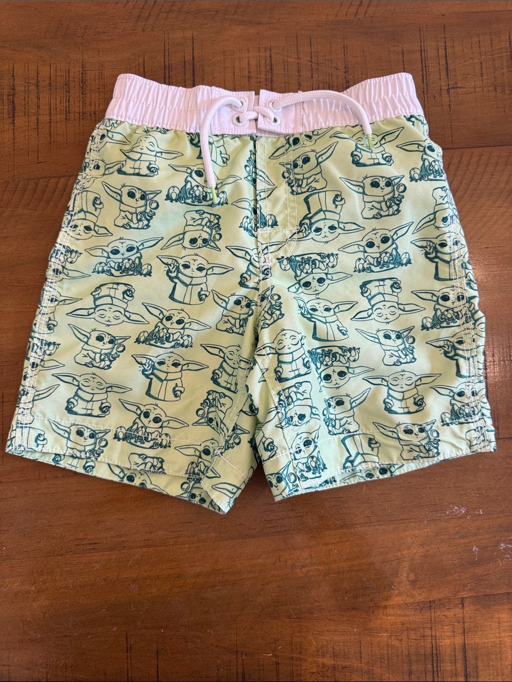 GAP Baby Yoda Print Swim Trunks in Light Green with White Waistband